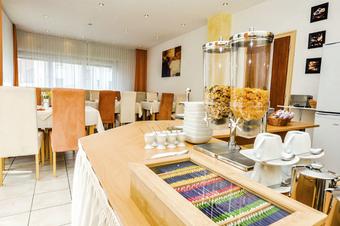 Hotel Garni Metzingen - Salón para desayunos